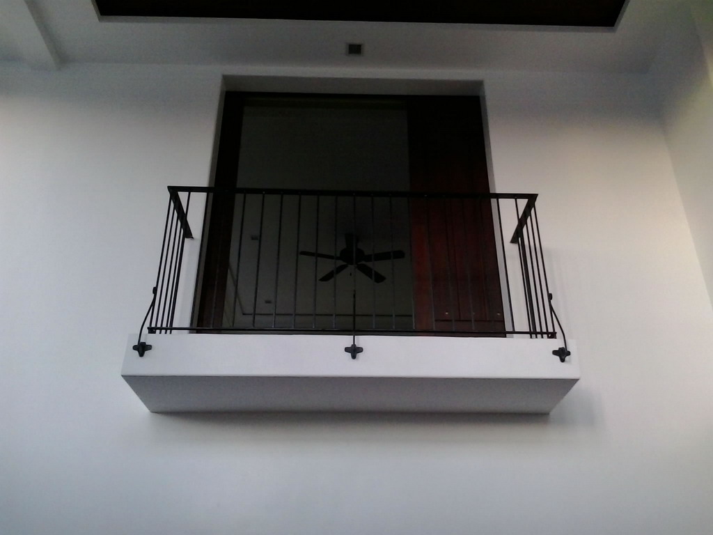 Balcony Railing in Wrought Iron Square Bar Scalop Design