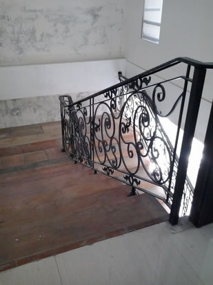 Wrought Iron Stair Railing, Entrance Gate, and False Balcony Railing