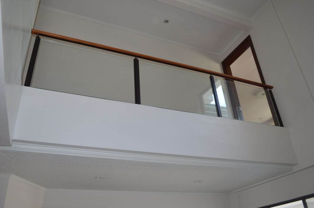 Glass Railing in wrought Iron Frame