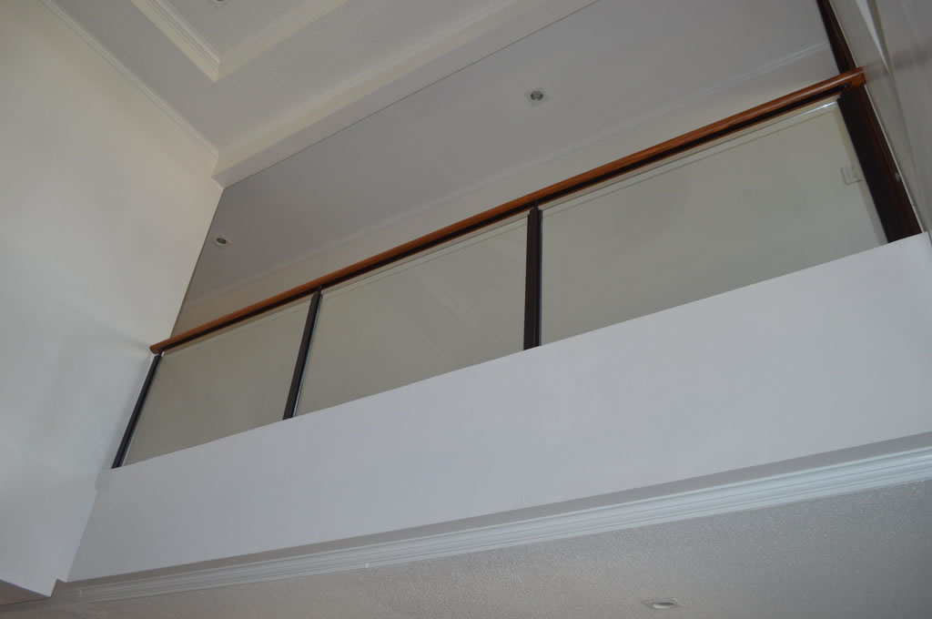 Glass Railing in wrought Iron Frame